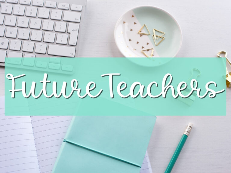 Overhead desktop image, gold triangle paperclips, silver keyboard, light turquoise notebook, matching pencil with the heading future teachers.